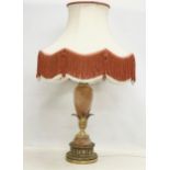 A large vintage ornate brass and onyx table lamp. Base measures 68cm. 97cm including shade.