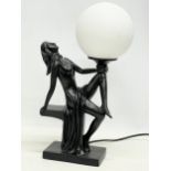 An Art Deco style lamp. 20x39cm