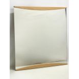 An Italian mirror by Calligaris. 70x70cm
