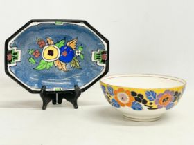 2 pieces of Charlotte shrewd pottery. Designed for Bursley Ware. Bowl measures 18x8cm. Dish 23.