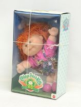 A Cabbage Patch Kids doll in box. Nichole Tamara. 24x42cm