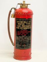 A vintage fire extinguisher. George Angus & Co. 59cm