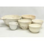 A collection of early to mid 20th century pottery baking and food preparation bowls. Including an