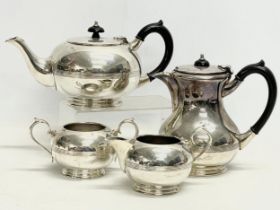 A 4 piece Walker & Hall silver plated tea service.