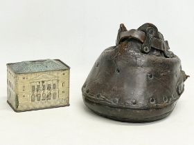 A Victorian leather lawn shoe and a vintage tin, The Queen’s Dolls’ House issued by Cauldon