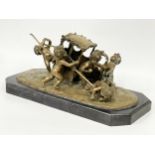 A large early 20th century ornate brass French Putti and carriage figure on marble base. In the