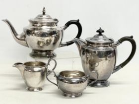 A 4 piece Walker & Hall silver plated tea service. Late 19th-early 20th century
