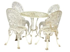 A vintage Victorian style cast alloy garden table and 4 chairs.