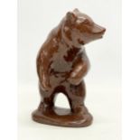 An early to mid 20th century glazed terracotta bear. 20cm