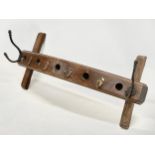 A large vintage oak wall hanging hat and coat rack. 80x20x33cm