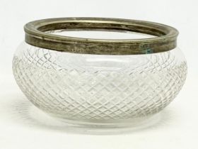 An early 20th century crystal bowl with silver plated rim. 22x11cm.