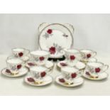A 21 piece Royal Stafford ‘Roses to Remember’ tea set.