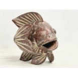 A vintage oriental terracotta fish. 18x18cm.