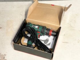 A Parkside 2-Speed corded power drill in box.
