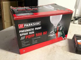 A sundry lot. A Parkside pneumatic paint spray gun in box, a Powerfix forstner drill bit set and a