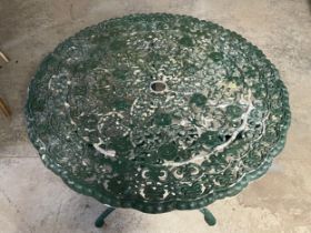 A vintage Victorian style cast alloy garden table. 80x72cm