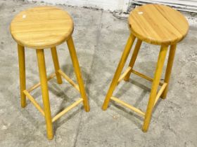A pair of solid beech highstools. 68cm