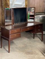 A clean Stag dressing table with stool. 152x46x127cm