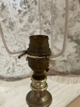 A vintage brass standard lamp. 160cm