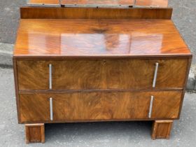 An Art Deco dressing chest.