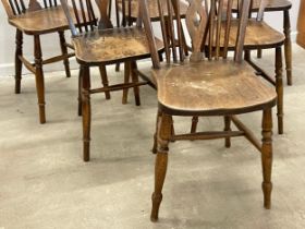 A set of 6 vintage wheel back dining chairs.