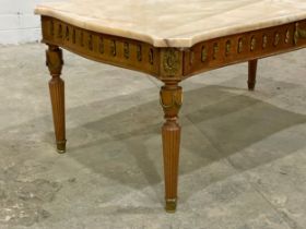 An ornate marble top coffee table with brass mounts. 95x56x42cm