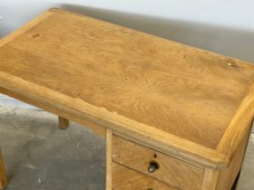 A vintage oak writing desk. 106x62x72cm