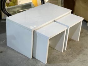 A coffee table with 2 nesting tables.