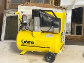 A Cosmo Air Compressor in box