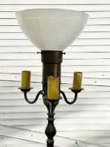 A vintage ornate metal standard lamp with glass shade. 158cm