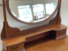 An Edwardian inlaid mahogany dressing chest. 106x51x167cm