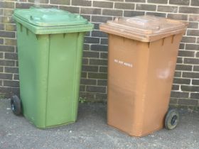 A green and brown bin.