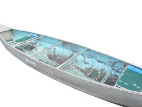 A large canoe. 519cm