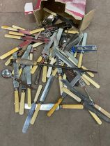 A quantity of large vintage cutlery. Carving knives etc.