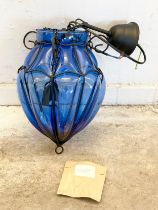 A blue bubble glass pendant light fitting. 33cm