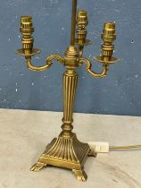 A large ornate brass table lamp. 72cm