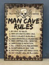 A large Man Cave Rules print. 62x93cm