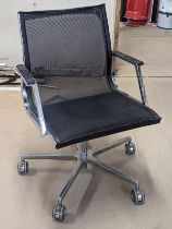 A modern swivel desk chair.