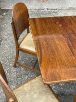 A vintage draw leaf table and 4 chairs.