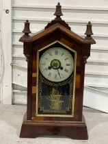 2 mantle clocks. A late 19th Jerome & Co mantle clock with key and pendulum. A vintage mantle