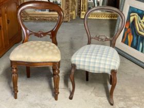 A Victorian mahogany balloon back chair and a Victorian style balloon back chair.