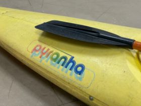 A kayak. 352cm