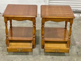 A pair of very clean 2 tier end tables with drawer. 54x54x61cm