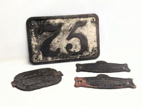 A collection of early 20th century cast iron railway plaques. Dated 1916, 1922.