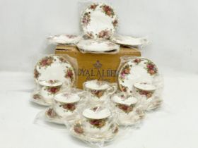 An unused 18 piece Royal Albert ‘Old Country Roses’ tea set in box.