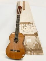 A Yamaha CG162C acoustic guitar, from Barnes & Mullins, London.