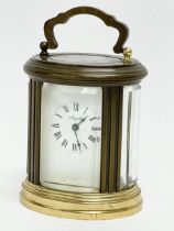 A small vintage French brass carriage clock. Angelus. 7x8cm