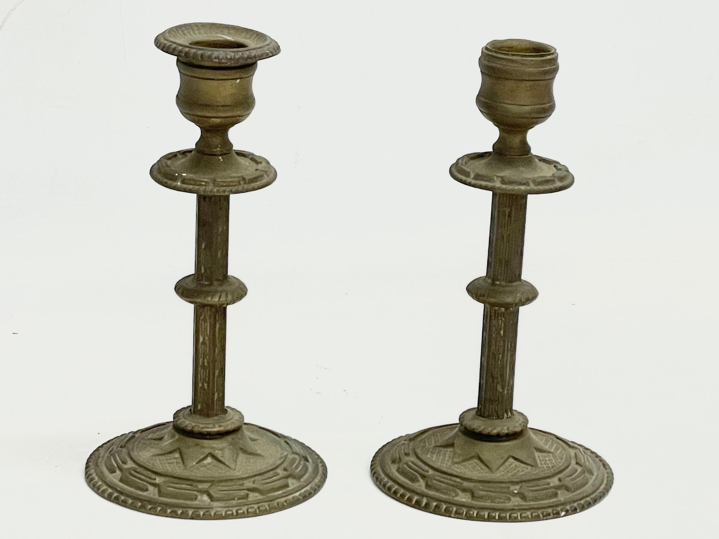 A 19th century spelter bust on stand with a pair of late 19th century brass candlesticks. Bust - Image 2 of 6