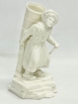 A Belleek Pottery Belgian Girl Hawker figure. 17cm