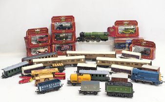 A collection of train carriages including Hornby, with model die-cast toy cars